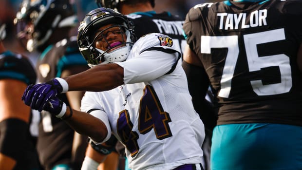 Marlon Humphrey celebrates after a tackle
